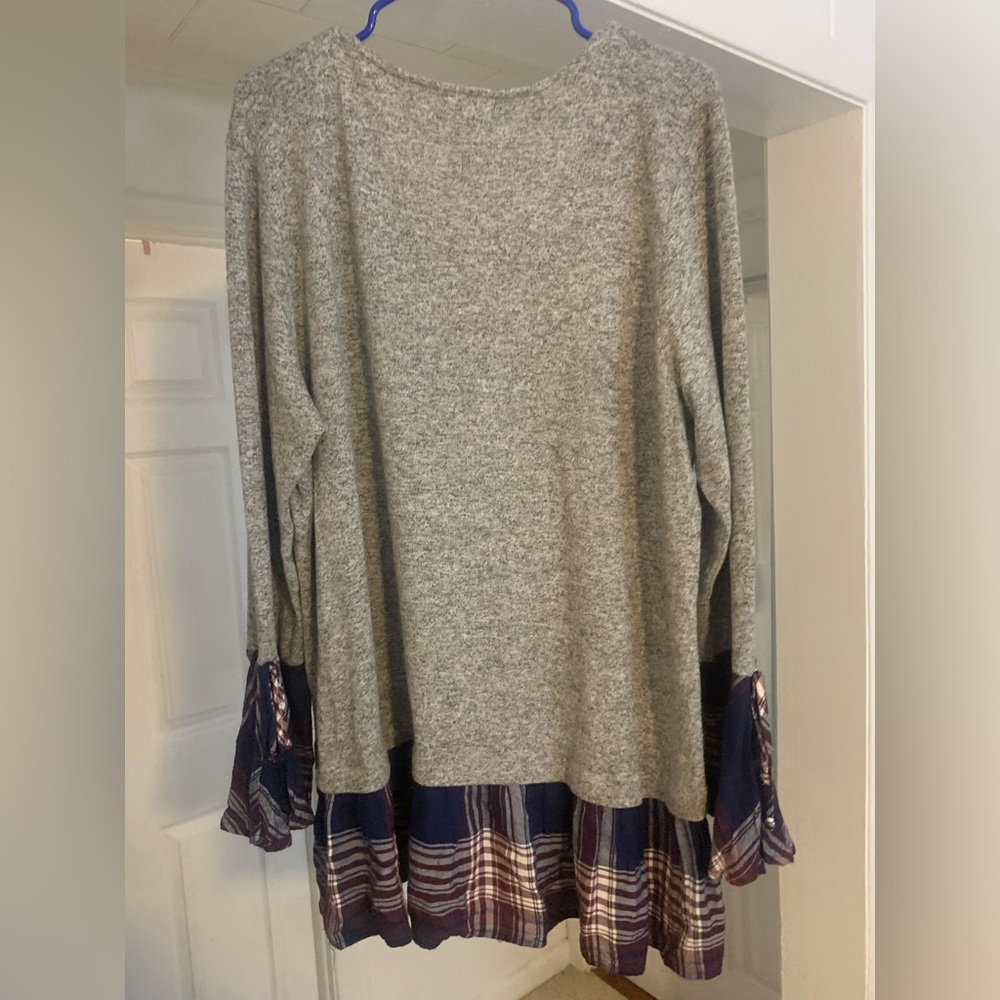 Sweater with shirt look under